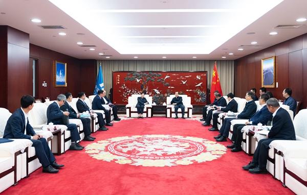 富腾优配  江毅与中国人保董事长、党委书记丁向群举行会谈